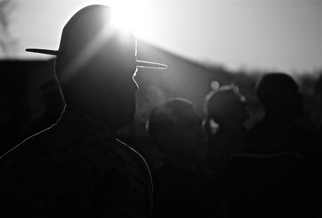 Sgt. Christapher Bess, a Drill Instructor with Company B, 1st Battalion, Recruit Training Regiment, Marine Corps Recruit Depot San Diego, looks on as Poolees from the southern half of Michigan participate in an Initial Strength Test (IST). The IST was conducted during a mini-boot camp conducted by Recruiting Station Lansing designed to expose poolees to the rigors of Marine Corps Recruit Training. 