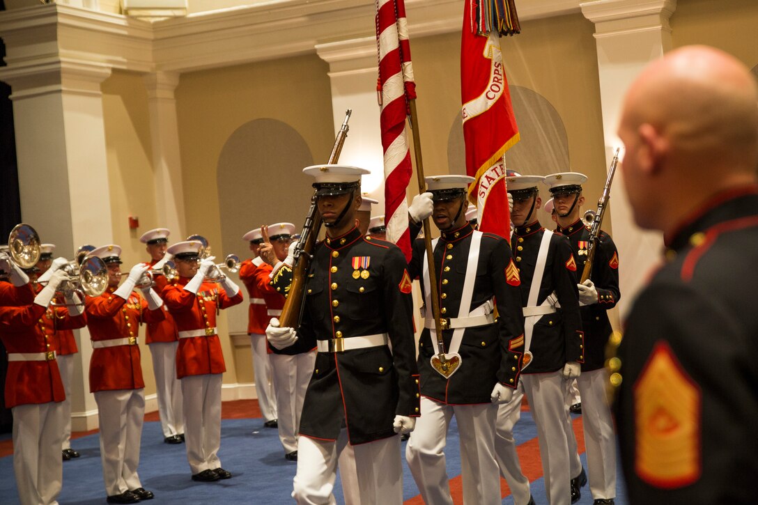 Sgt. Maj. Micheal P. Barrett, sergeant major of the Marine Corps, watches the U.S. Marine Corps Color Guard perform during an indoor performance at Marine Barracks Washington, D.C., April 25, 2014. (Official Marine Corps photo by Cpl. Dan Hosack/Released)