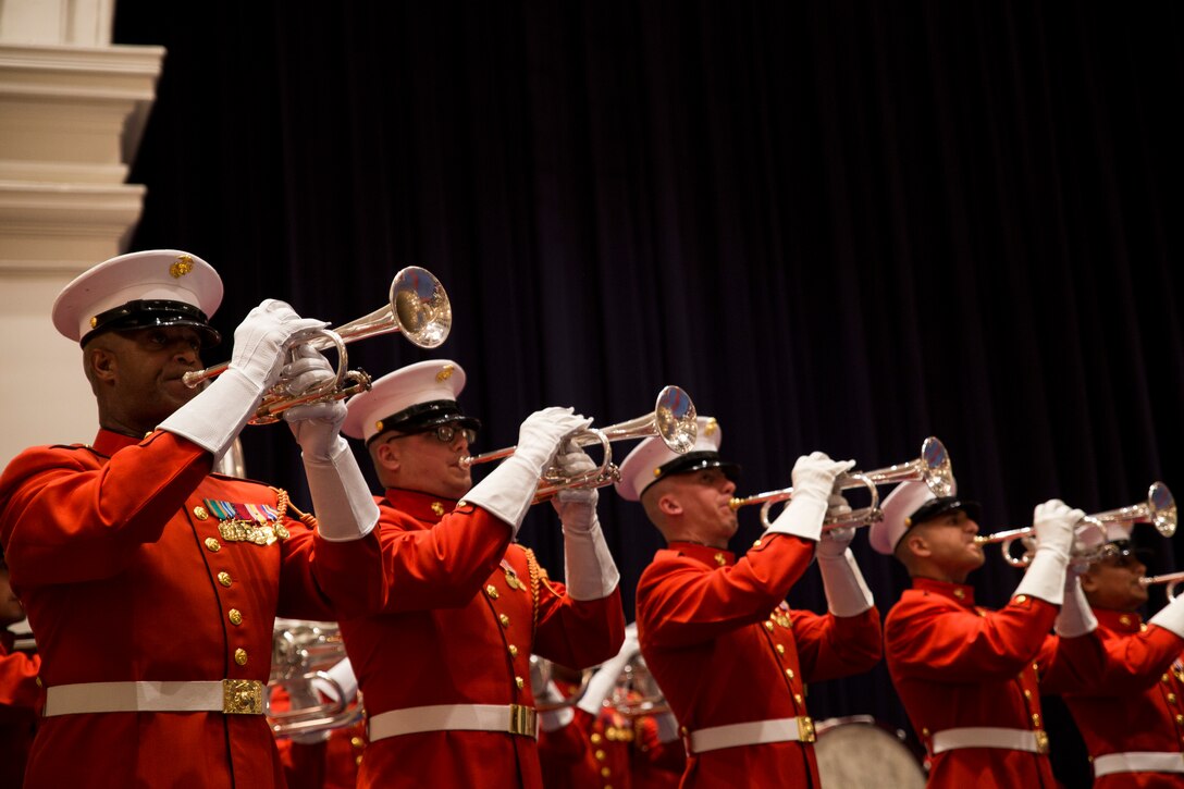 Members of the U.S. Marine Drum & Bugle Corps perform during an indoor performance at Marine Barracks Washington, D.C., April 25, 2014. (Official Marine Corps photo by Cpl. Dan Hosack/Released)