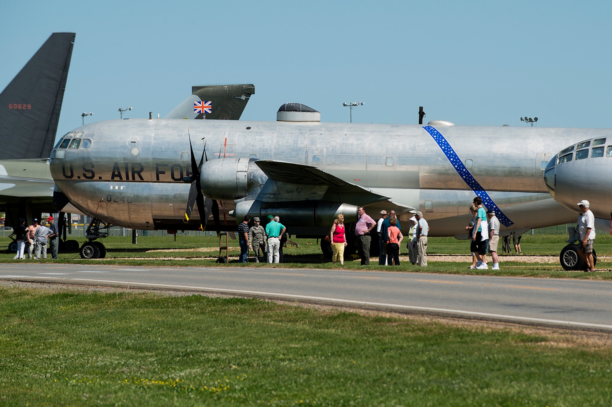 Members of the 307th Bomb Wing B-47/KC-97 Association gather around a KC-97 on display at the Barksdale Global Power Museum, April 25, 2014, Barksdale Air Force Base, La. The association chose Bossier City, La., as the site for this year’s reunion and was able to spend the day touring the base and the headquarters of the current 307th Bomb Wing. (U.S. Air Force photo by Master Sgt. Greg Steele/Released)