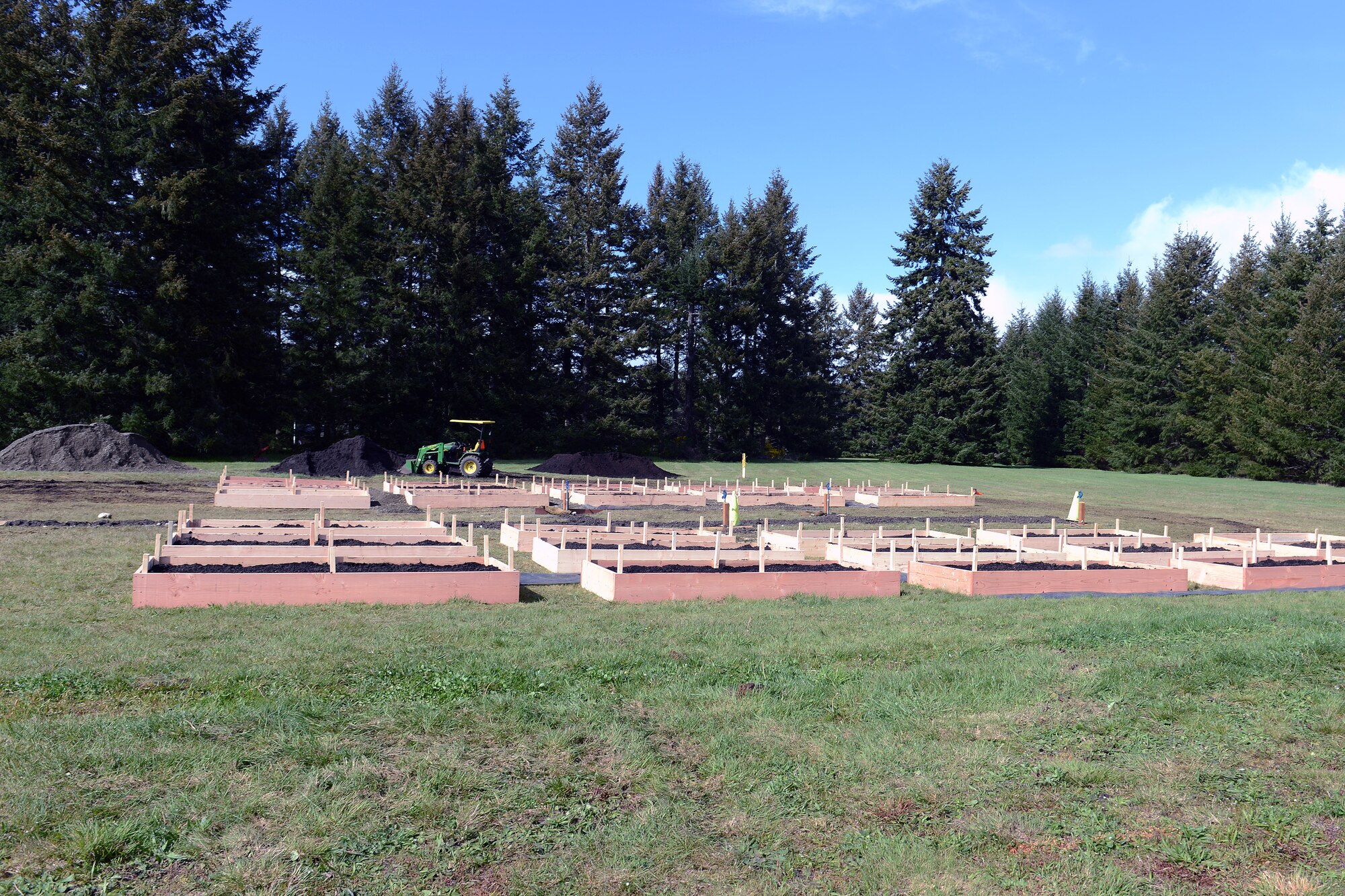 Thirty raised garden beds sit prepared for planting April 17, 2014, by the McChord Field stables at Joint Base Lewis-McChord, Wash. Service members will be able to rent a garden bed through Adventures Unlimited once further construction completed. (U.S. Air Force photo/Airmen 1st First Class Jacob Jimenez) 