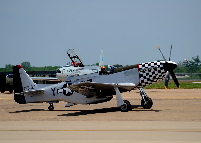 A P-51 Mustang taxis to the runway during the 2014 Defenders of Liberty Air Show on Barksdale Air Force Base, La., April 26. 2014. P-51 Mustangs have served in nearly every combat zone, including the Pacific where they escorted B-29 Superfortress? to Japan from Iwo Jima. (U.S. Air Force photo/Staff Sgt. Sean Martin)