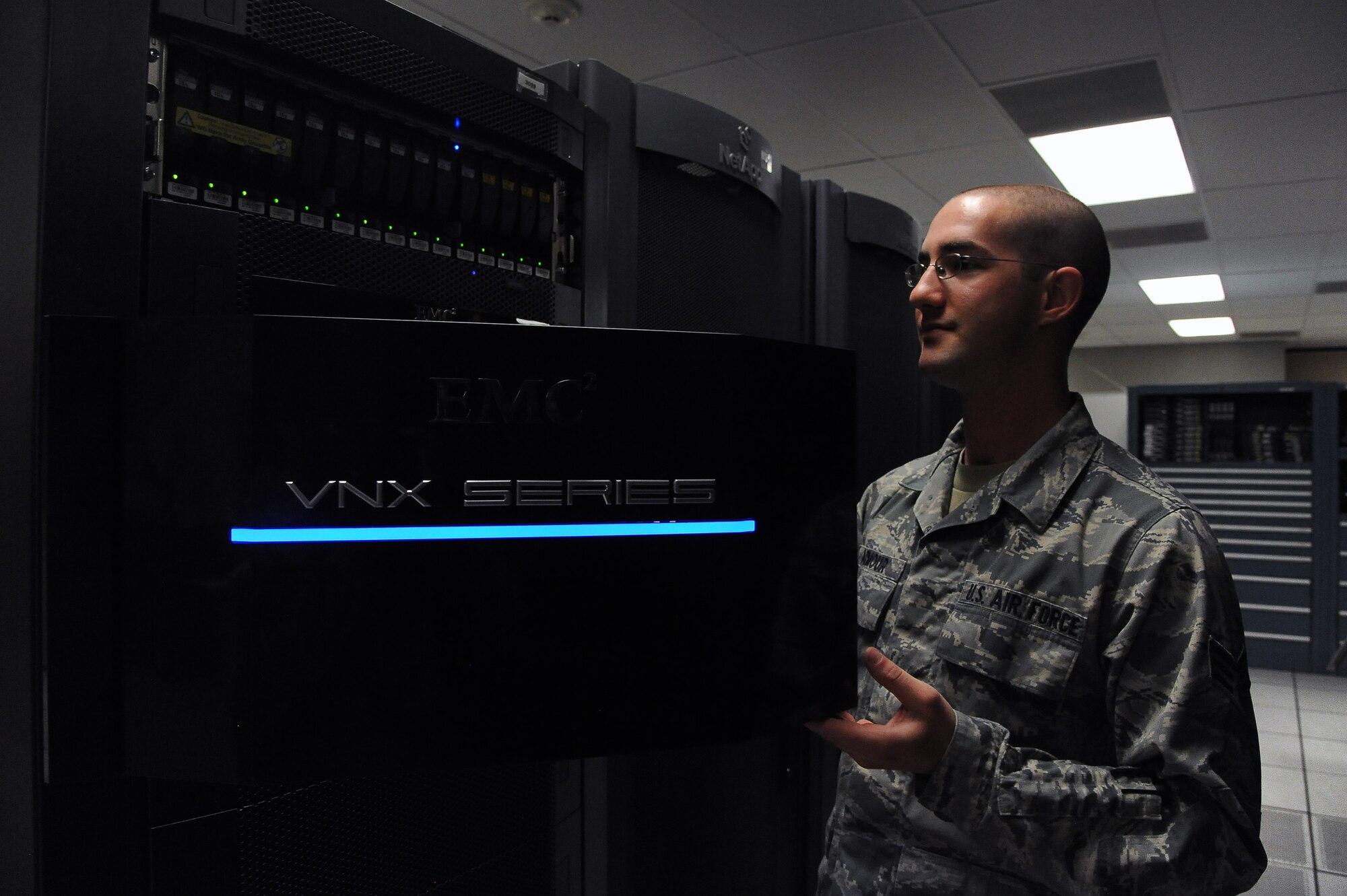 Senior Airman Shane Armour, 56th Communications Squadron networks operation technician, checks the file-share hard drives April 16 at Luke Air Force Base to ensure the drives were running properly to maintain the wing’s documents and files. (U.S. Air Force photo/Airman 1st Class Pedro Mota)