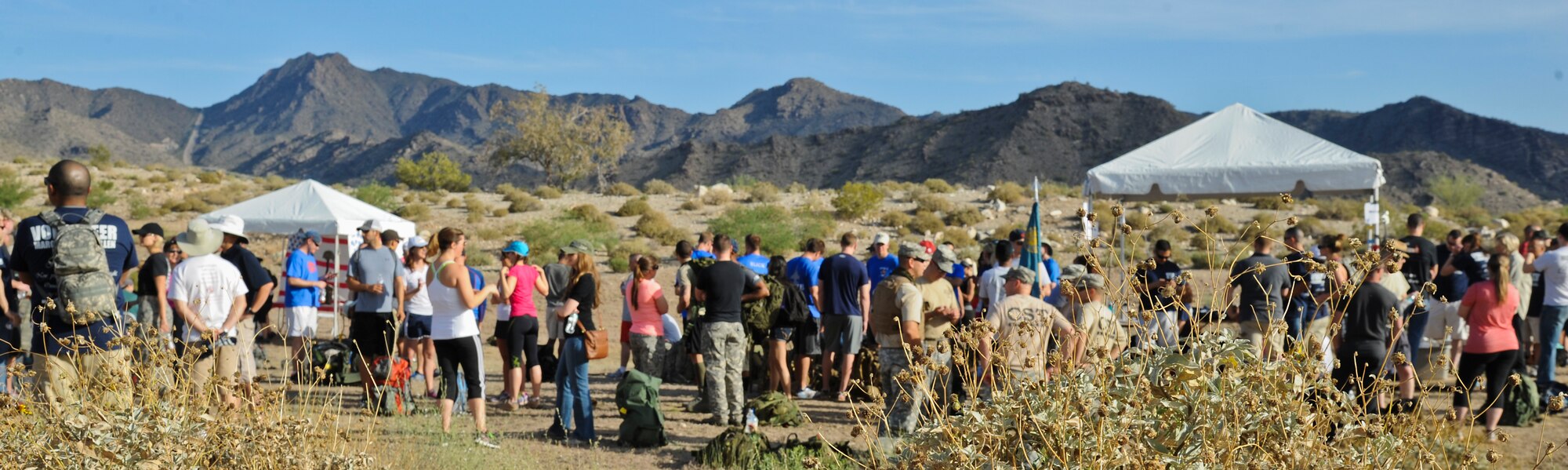Military members and local community members gather April 20 to participate in the 2014 March of the Fallen event at the Raven Golf Course at Verrado in Buckeye. (U.S. Air Force photo/Staff Sgt. Darlene Seltmann)