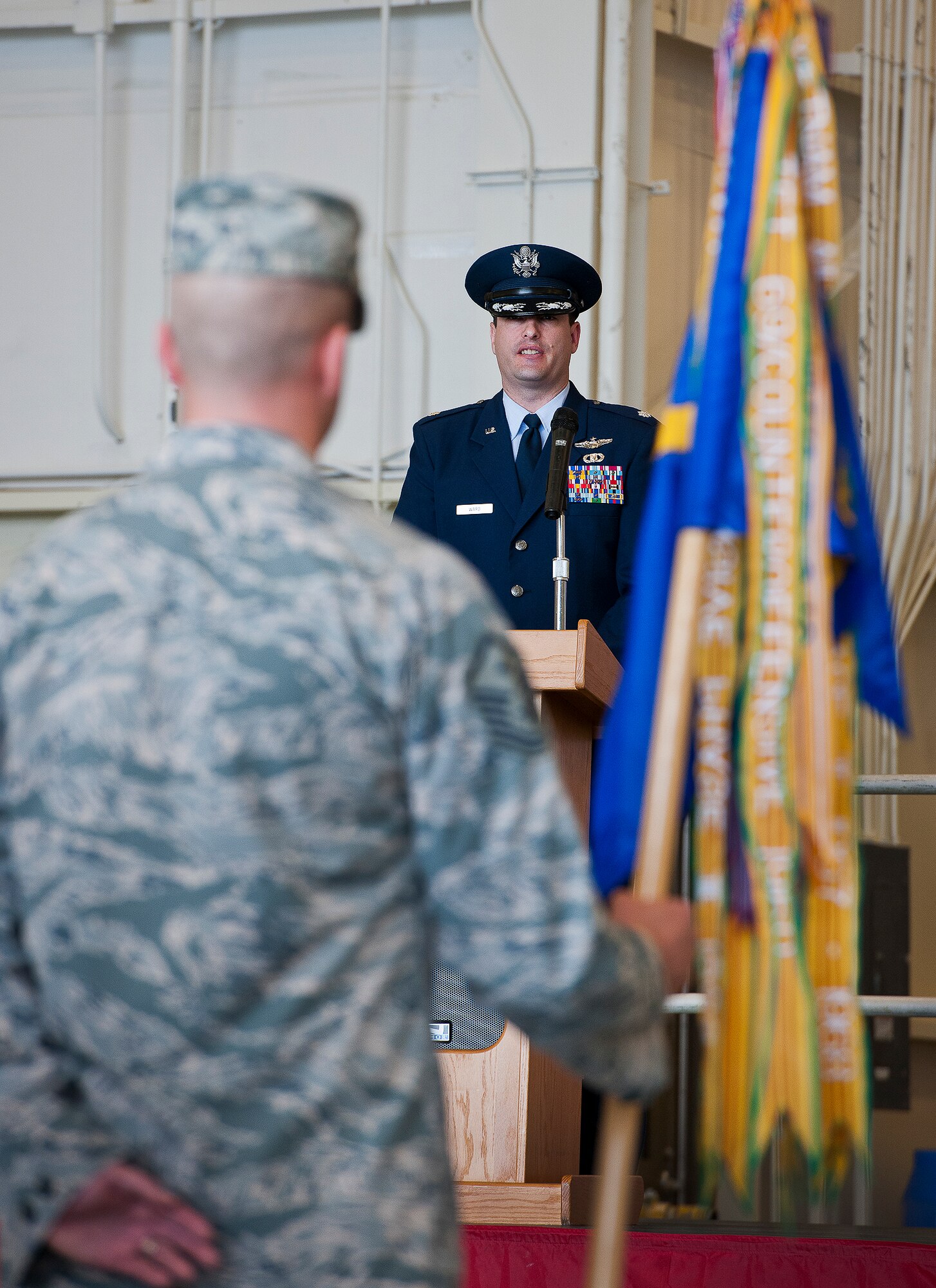 Lt. Col. Casey Ward speaks to the 6th Special Operations Squadron for the first time as its commander during a change of command ceremony at Duke Field, Fla., April 25.  The 6th SOS is an active-duty combat aviation advisor squadron located at Duke Field Fla.  They work directly with the Reserve’s 5th Special Operations Squadron flying aviation foreign internal defense aircraft.  (U.S. Air Force photo/Tech. Sgt. Samuel King Jr.)