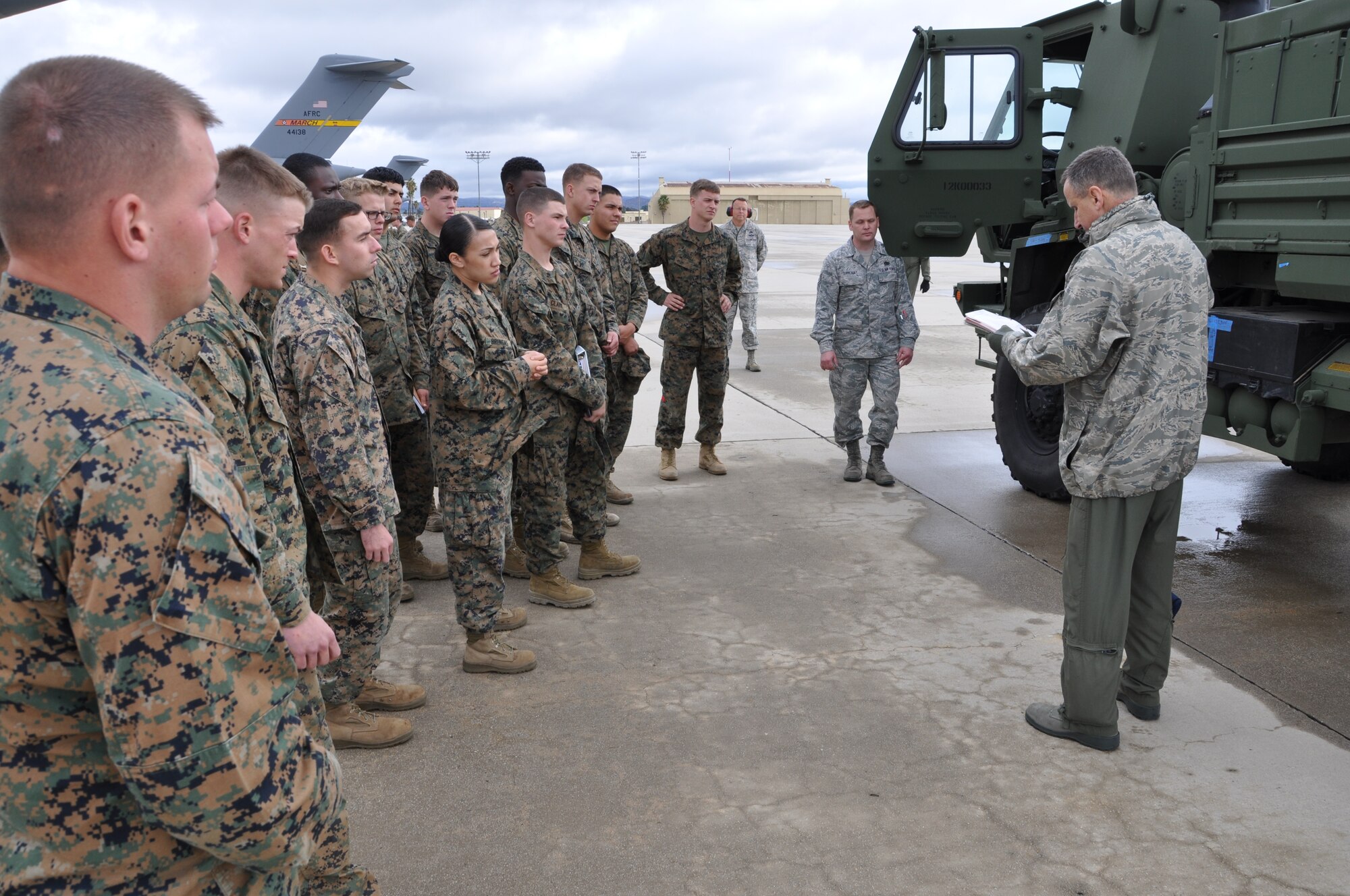 Marines and Airmen assigned to March Air Reserve Base, Calif., provide Aerial
Port Operations training at March on Feb 27, 2014, to Marine Logisticians assigned
to the 1st Marine Expeditionary Force, Camp Pendleton, Calif. (U.S. Air
Force photo/Sean Dath)
