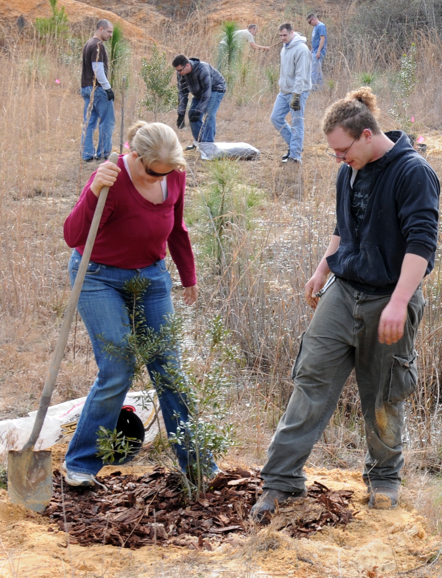 Volunteers plant trees on Eglin's reservation during a recent conservation opportunity. At 464,000 acres, Eglin is the largest forested military installation in the world. . (courtesy photo)
