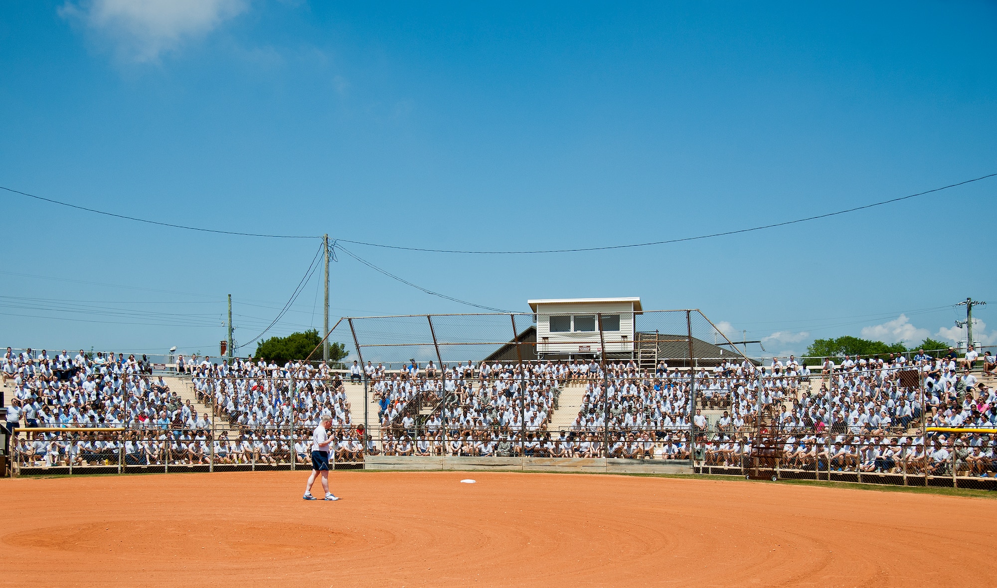 Brig. Gen. David Harris, addresses his Airmen at the 96th Test Wing’s Wingman Day event April 24 at Eglin Air Force Base, Fla.  The morning events were for unit training then everyone converged on Foster Stadium for food and field day activities.  The theme of this year’s event was “Everyone’s a Mentor.”  (U.S. Air Force photo/Samuel King Jr.)