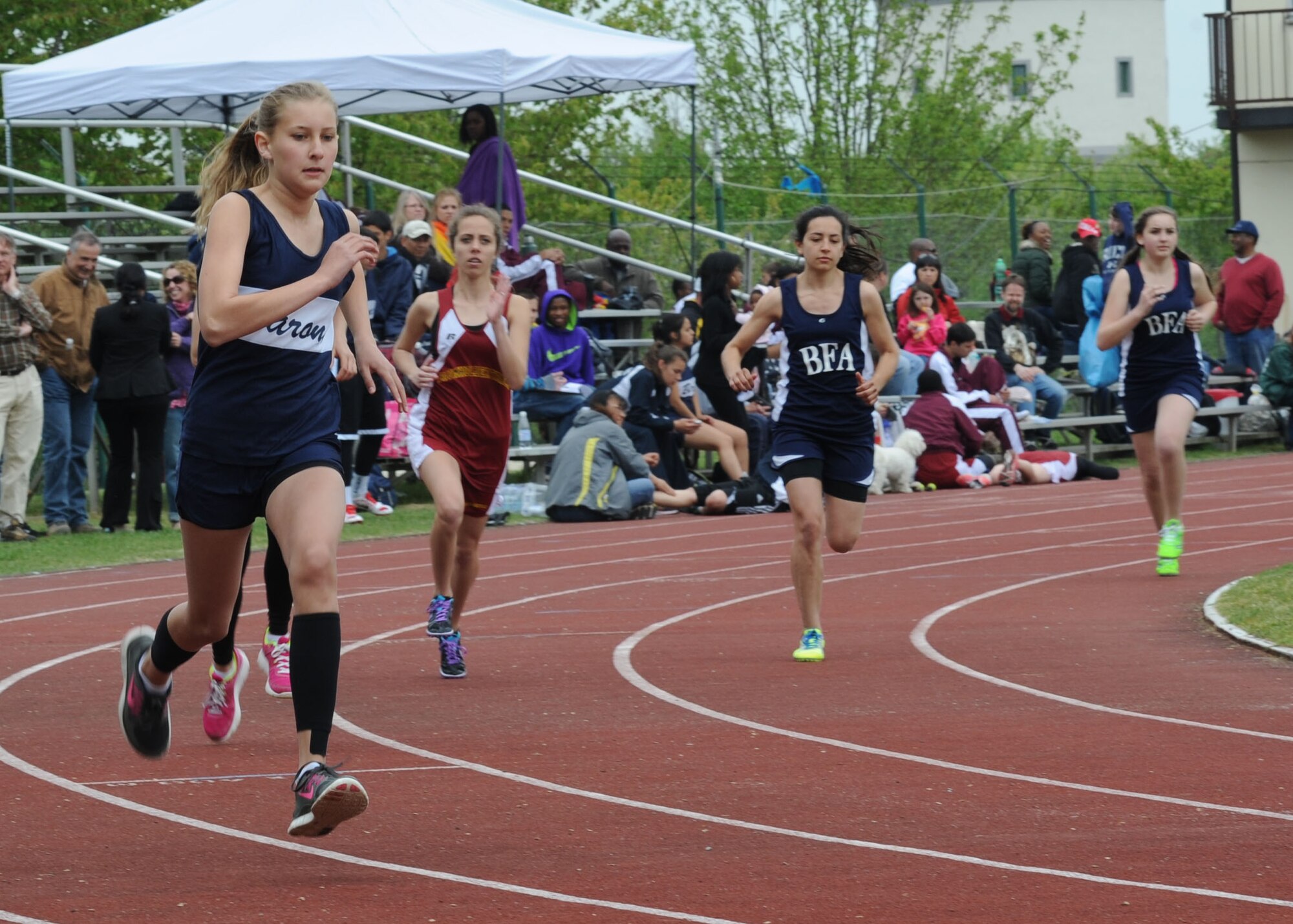 Bitburg Middle High School track athletes begin a race April 26, 2014, at the school track on Bitburg Base Annex, Germany. The Bitburg Lady Barons finished in third place overall against four other schools. (U.S. Air Force photo by Airman 1st Class Dylan Nuckolls/Released)