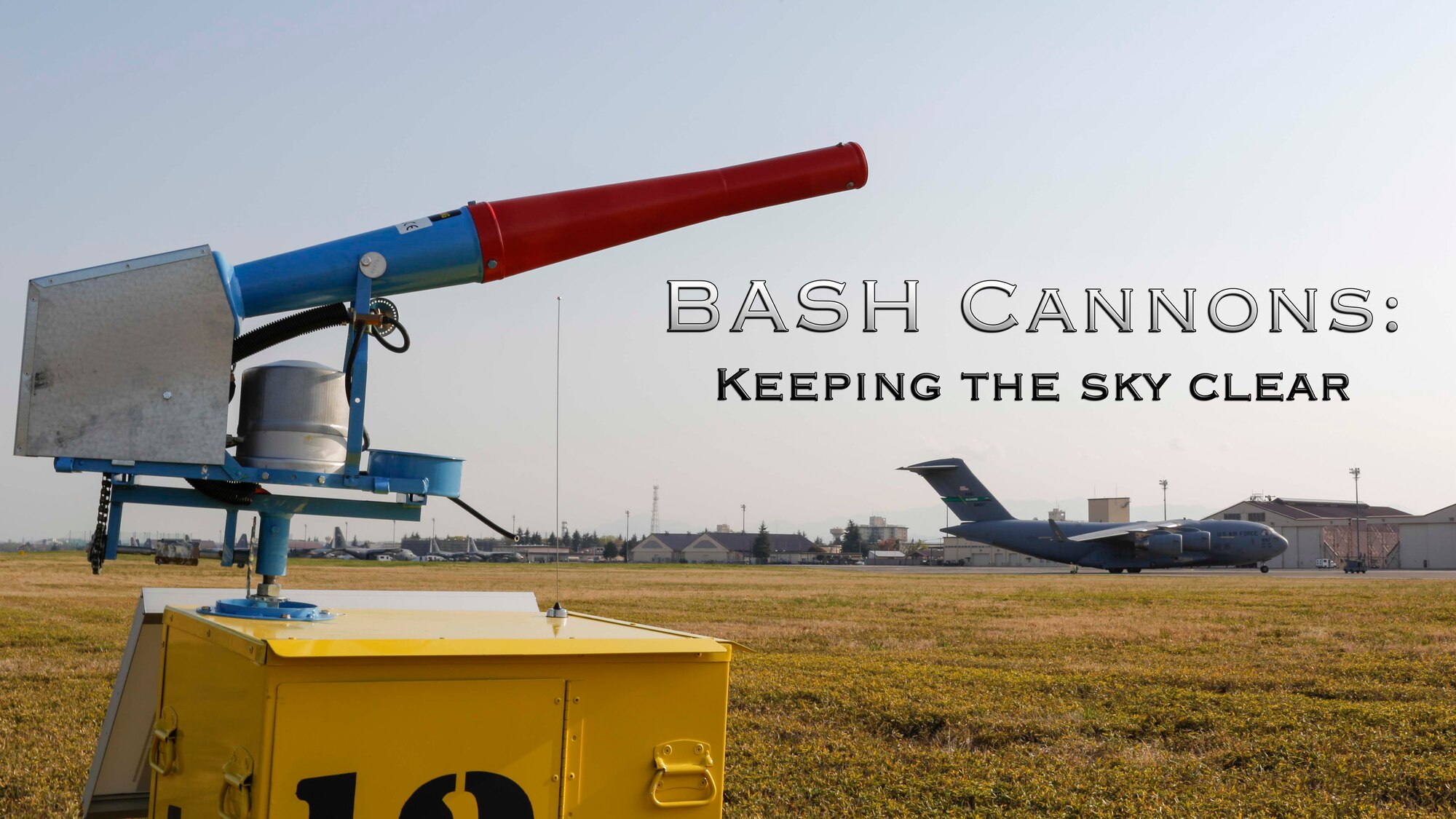 A new Bird/Wildlife Aircraft Strike Hazard cannon aims towards the sky after being installed at Yokota Air Base, Japan, April 11, 2014.  The remote-activated, solar-powered cannon simulates threatening sounds, such as predator calls and explosions, to scare wildlife away and mitigate possible damage to aircraft during take-off and landing.(U.S.Air Force graphic by Airman 1st Class Soo C. Kim / Released)