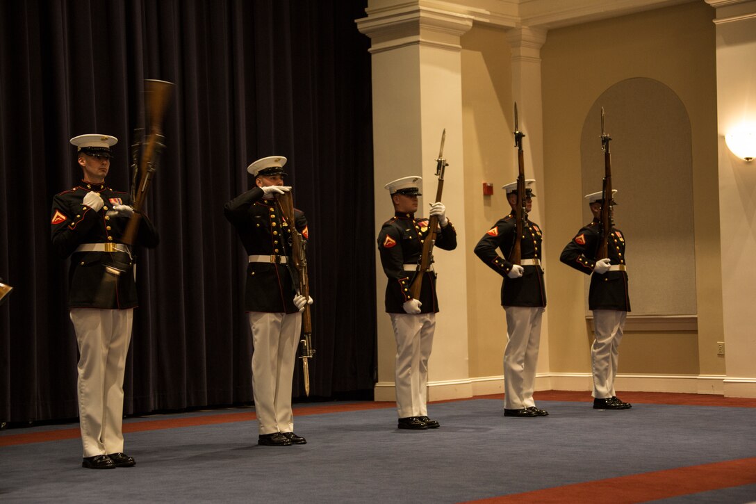 Marines with the Silent Drill Platoon perform at Marine Barracks Washington, D.C., April 25. The performance was part of a two-day Committed and Engaged Leadership Seminar in Washington, D.C., where 52 Marines with the 3rd Marine Aircraft Wing visited the barracks.   