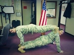Capt. Sarah Lambert and 2nd Lt. Mary K. Jorgensen of the Pennsylvania National Guard participate in Guard Your Health's Small Steps Challenge at Fort Indiantown Gap, Pa.
