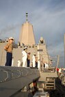 U.S. Marines and Sailors man the rails as they pull into port of South Florida aboard the USS New York (LPD 21), April 28, as part of Fleet Week Port Everglades 2014. Approximately 120 Marines from 2nd Assault Amphibian Battalion, 2nd Marine Division, Marine Corps Base Camp Lejeune, N.C., 2nd Battalion, 6th Marine Regiment, 2nd Marine Division, Marine Corps Base Camp Lejeune, N.C., and Marine Light Attack Helicopter Squadron (HMLA) 269, Marine Corps Air Station New River, N.C., are participating in the 24th Annual Fleet Week in Port Everglades; South Florida’s annual celebration of maritime forces. (U.S. Marine Corps photo by Sgt. Alicia R. Leaders/Released)