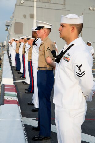 U.S. Marines and Sailors man the rails as they pull into port of South Florida aboard the USS New York (LPD 21), April 28, as part of Fleet Week Port Everglades 2014. Approximately 120 Marines from 2nd Assault Amphibian Battalion, 2nd Marine Division, Marine Corps Base Camp Lejeune, N.C., 2nd Battalion, 6th Marine Regiment, 2nd Marine Division, Marine Corps Base Camp Lejeune, N.C., and Marine Light Attack Helicopter Squadron (HMLA) 269, Marine Corps Air Station New River, N.C., are participating in the 24th Annual Fleet Week in Port Everglades; South Florida’s annual celebration of maritime forces. (U.S. Marine Corps photo by Sgt. Alicia R. Leaders/Released)