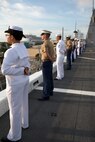 U.S. Marines and Sailors man the rails as they pull into port of South Florida aboard the USS New York (LPD 21), April 28, as part of Fleet Week Port Everglades 2014. Approximately 120 Marines from 2nd Assault Amphibian Battalion, 2nd Marine Division, Marine Corps Base Camp Lejeune, N.C., 2nd Battalion, 6th Marine Regiment, 2nd Marine Division, Marine Corps Base Camp Lejeune, N.C., and Marine Light Attack Helicopter Squadron (HMLA) 269, Marine Corps Air Station New River, N.C., are participating in the 24th Annual Fleet Week in Port Everglades; South Florida’s annual celebration of maritime forces. (U.S. Marine Corps photo by Sgt. Alicia R. Leaders/Released)