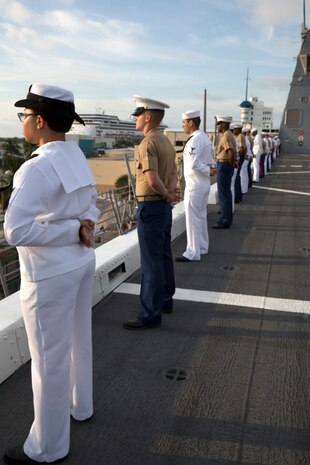 U.S. Marines and Sailors man the rails as they pull into port of South Florida aboard the USS New York (LPD 21), April 28, as part of Fleet Week Port Everglades 2014. Approximately 120 Marines from 2nd Assault Amphibian Battalion, 2nd Marine Division, Marine Corps Base Camp Lejeune, N.C., 2nd Battalion, 6th Marine Regiment, 2nd Marine Division, Marine Corps Base Camp Lejeune, N.C., and Marine Light Attack Helicopter Squadron (HMLA) 269, Marine Corps Air Station New River, N.C., are participating in the 24th Annual Fleet Week in Port Everglades; South Florida’s annual celebration of maritime forces. (U.S. Marine Corps photo by Sgt. Alicia R. Leaders/Released)