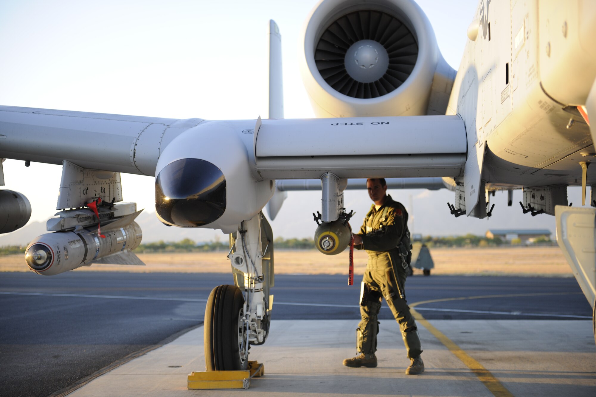 140428-Z-EZ686-038— Capt. Shannon Vickers of the 107th Fighter Squadron does a pre-flight check prior to his flight in the A-10 Thunderbolt II aircraft from Selfridge Air National Guard Base Mich., during the 2014 Operation Snowbird/Angel Thunder training mission at Davis-Monthan Air Force Base, Tucson, Ariz., April 26, 2014.  It is standard procedure for all pilots to do a pre-flight check of the aircraft prior to their flight. (U.S. Air National Guard photo by MSgt. David Kujawa/Released)