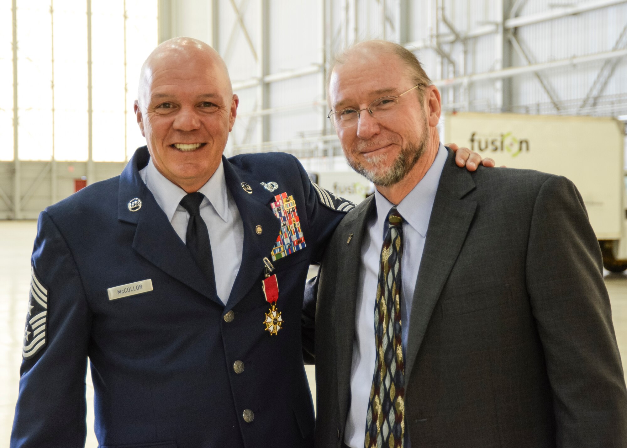 TWO FIRSTS SAY GOODBYE: Chief Master Sgt. Christopher McCollor (left), Air Force Test Center command chief, is joined by Dr. Davy Belk (right) who is also retiring as the Air Force Test Center’s first executive director after more than 36 years of service to the Air Force. Both McCollor and Belk were the first to serve the AFTC in their respective leadership positions since the 2012 Five-center-construct completed by Air Force Materiel Command. (U.S. Air Force photo by Rebecca Amber)

