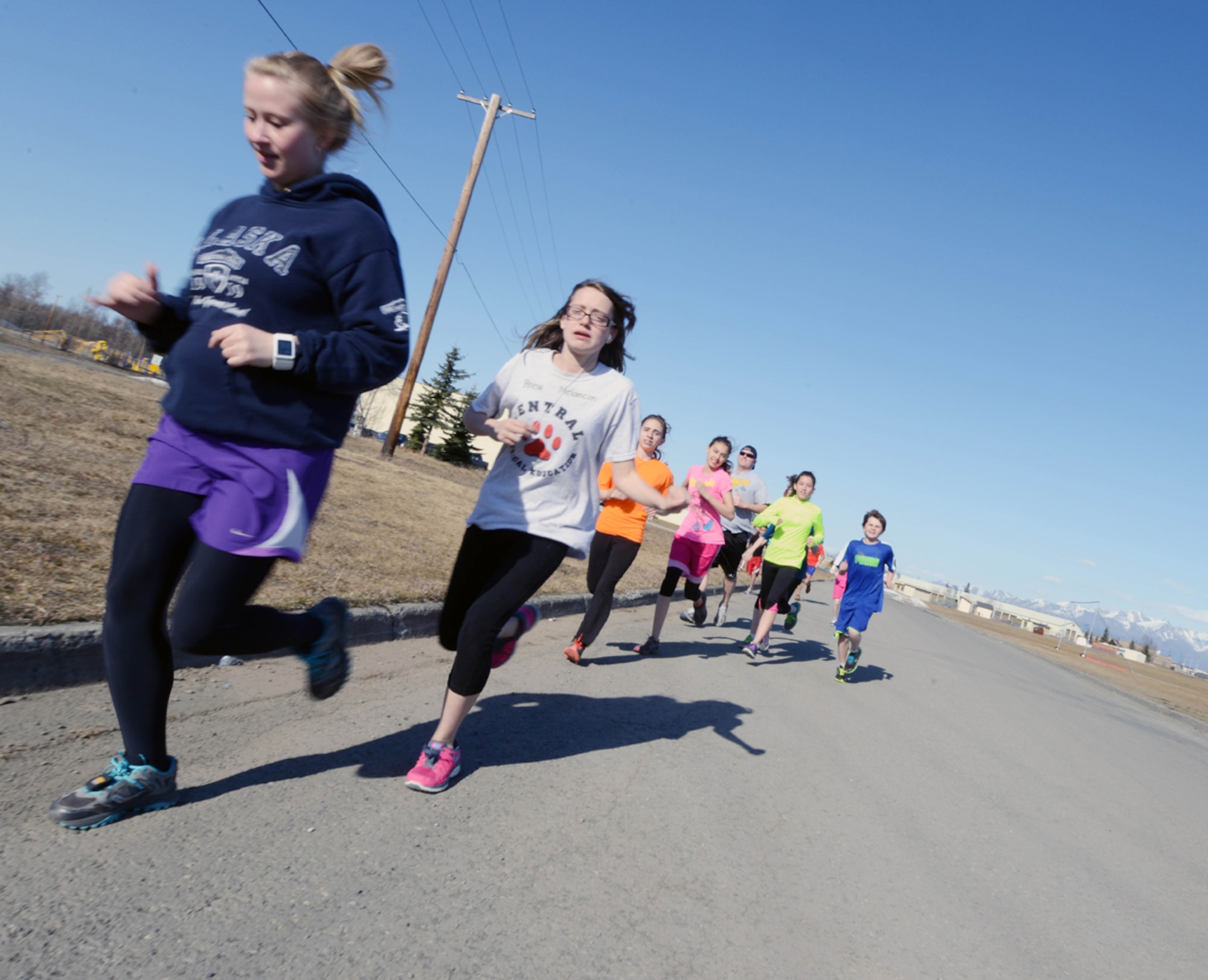 JOINT BASE ELMENDORF-RICHARDSON, Alaska -- Military youth participate in the Kennecott Youth Center Run Club on Joint Base Elmendorf-Richardson, Alaska, April 21, 2014. The Club invites children to run three to six miles Mondays, Wednesdays and Fridays. Volunteers may assist children in the running sessions. (U.S. Air Force photo/Airman 1st Class Ty-Rico Lea)