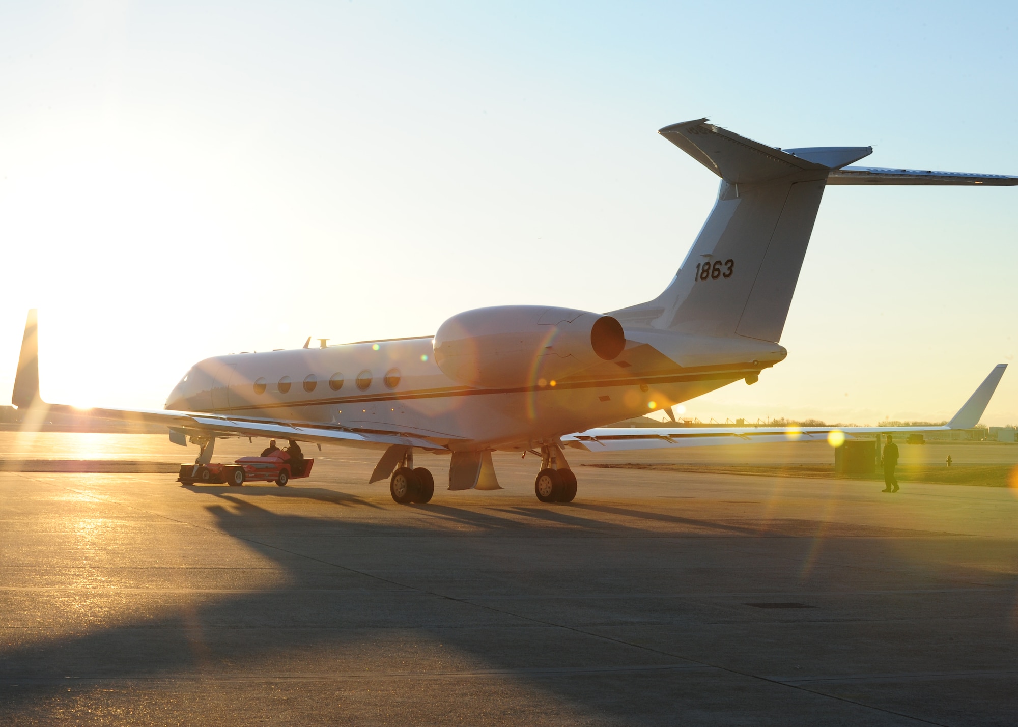 Aircraft technicians tow an United States Army Priority Air Transport C-37 Gulfstream into it’s spot on the flightline at Joint Base Andrews March 13, 2014. USAPAT provides worldwide executive airlift in support of U.S. Army senior leaders, Department of Defense executives, congressional delegations and combatant commanders. (U.S. Air Force photo/Airman 1st Class Aaron Stout)