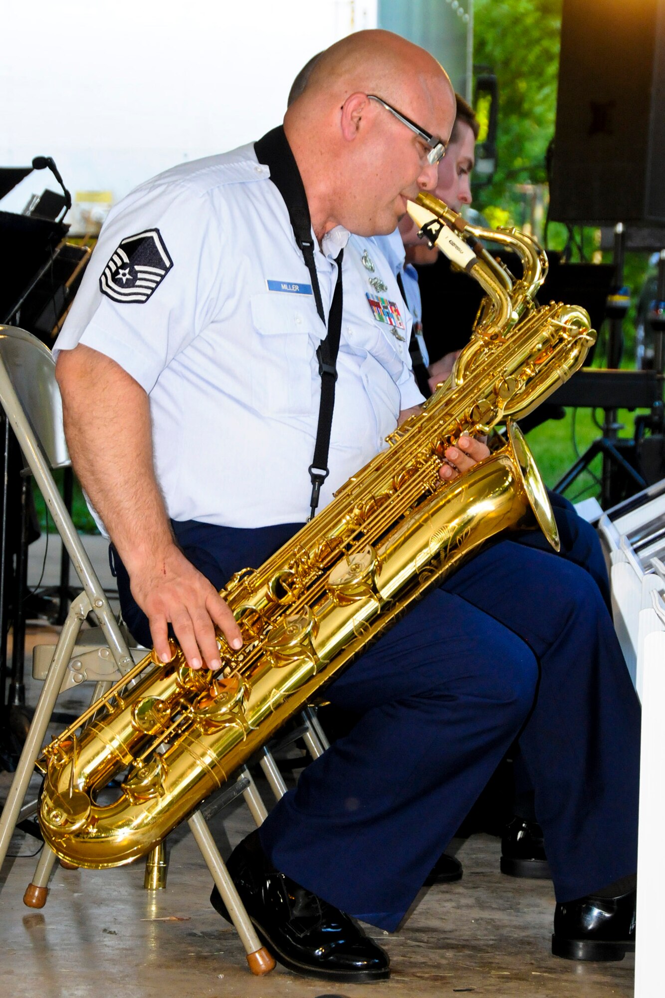 U.S. Air Force Master Sgt. Jesse A. Miller Jr, an instrumentalist with the 566th Air Force Band, plays the alto saxophone during the Air National Guard Band of the Midwest summer tour June 30, 2013. The University of Illinois awarded him with the Campus Awards for Excellence in Public Engagement for applying his knowledge and expertise to social issues for the public good. Miller works as a teaching laboratory specialist in the university’s chemistry department. (U.S. Air National Guard photo by TSgt Todd A. Pendleton/Released)
