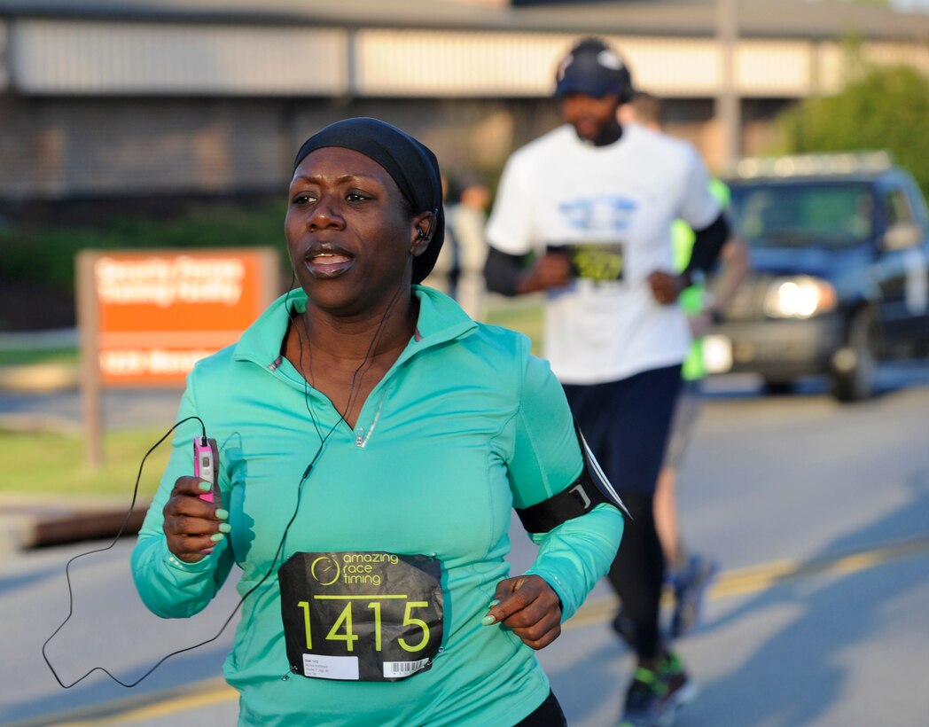 A half marathon runner begins the first leg of the race on Joint Base Andrews, Md., April 26, 2014. The second annual JBA half marathon had 199 registered participants.  (U.S. Air Force photo/Senior Airman Nesha Humes)

