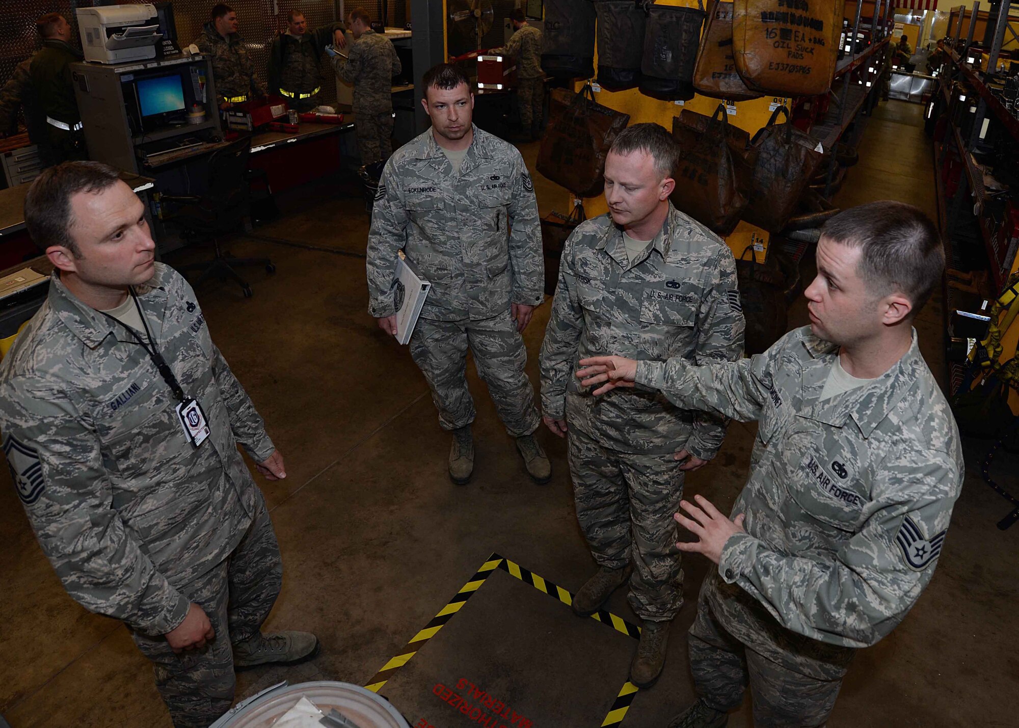 Staff Sgt. James Deomony, 28th Aircraft Maintenance Squadron unit environmental coordinator, explains various procedures for the consolidated toolkit shop to Senior Master Sgt. Kieth Galliani, Air Combat Command Inspector General team member, during a Unit Effectiveness Inspection at Ellsworth Air Force Base, S.D., April 16, 2014. Various aspects of the CTK shop were inspected and evaluated to ensure mission readiness. (U.S. Air Force photo by Airman 1st Class Rebecca Imwalle/ released)