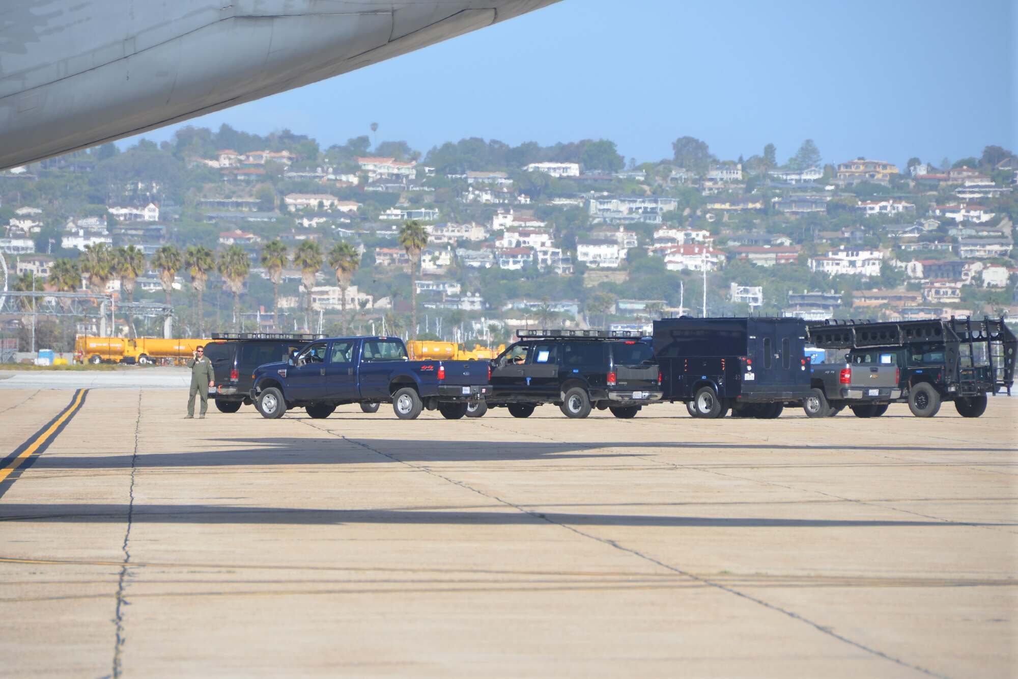 Several vehicles belonging to FBI’s Rapid Deployment Team from Los Angeles Calif., line the flight line, ready to be loaded on a C-5A Galaxy aircraft, April 24, 2014 at the Naval Air Station, North Island, Calif. The FBI’s RDT was one of several affiliates who participated in the annual Patriot Hook Exercise, sponsored by the Air Force Reserve Command that integrates federal agencies with the military, for world-wide mobility and readiness. (U.S. Air Force photo/Senior Master Sgt. Minnie Jones)


