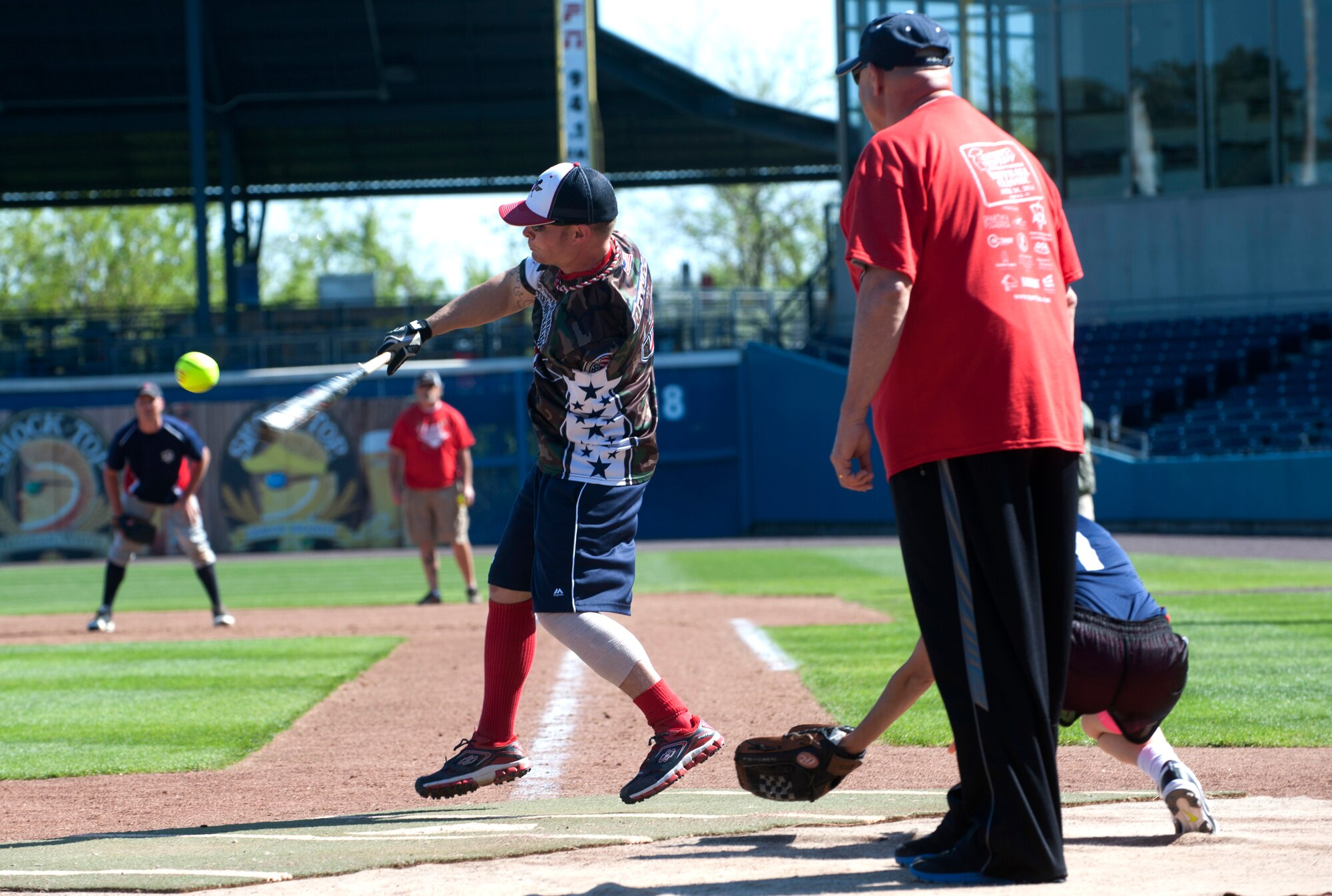 Greg Reynolds, a U.S. Army veteran and Wound Warrior Amputee Softball team infielder, takes a swing during the 2nd annual Spartyka Wounded Warrior Softball Classic at Harbor Park in Norfolk, Va., April 26, 2014. The Wounded Warrior squad faced the ADS Inc., and the combined Old Dominion University and Norfolk State University ROTC teams at the Norfolk Tides’ stadium, and went .500 on the day with an 11-6 loss and 10-0 win, respectively. (U.S. Air Force photo by Senior Airman R. Alex Durbin/Released)