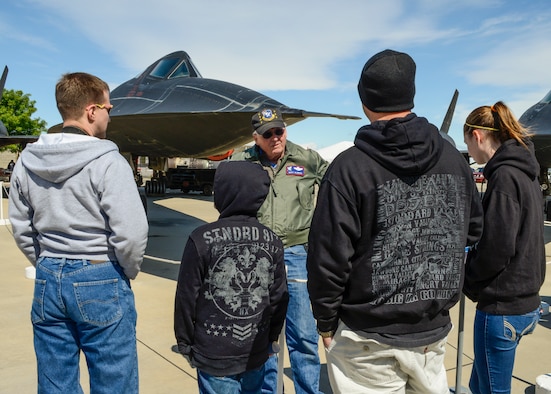 Gary Aldrich, a member of the board of directors for the Flight Test Historical Foundation, answers questions about the SR-71 behind him during the SR-71 and U-2, 50-Year Cold War Commemoration at Blackbird Airpark at Plant 42, April 26. (U.S. Air Force photo by Rebecca Amber)