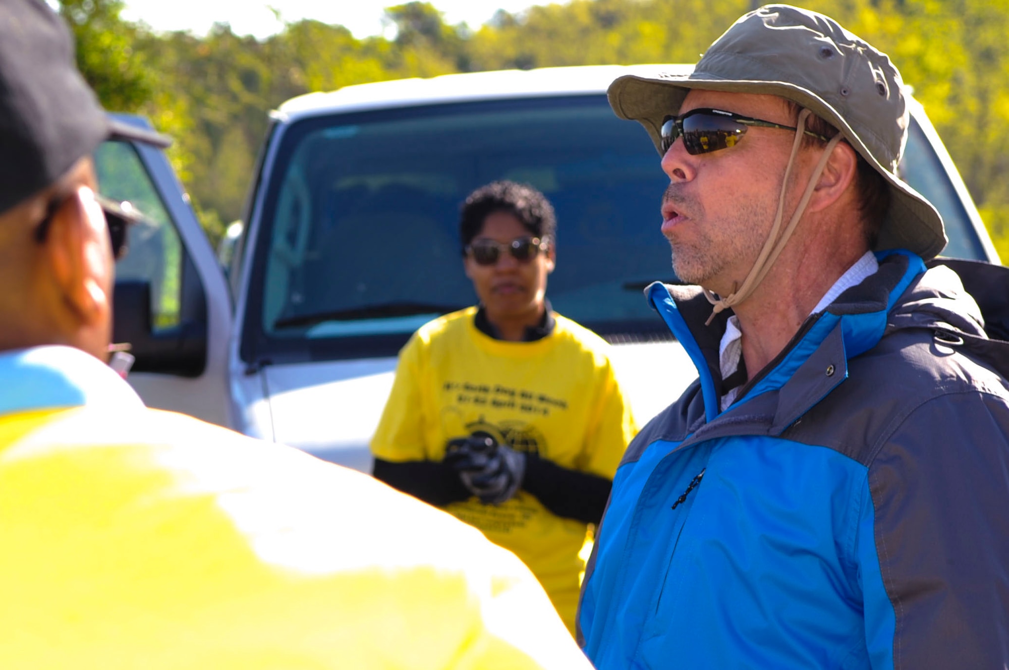 Tim Christensen, 733rd Civil Engineer Division environmental and natural resources specialist, briefs community members before a shoreline planting activity at Fort Eustis, Va., April 23, 2014. Each year, volunteers plant new shoreline grass to prevent erosion, which preserves the more inland habitats at Fort Eustis. (U.S. Air Force photo by Senior Airman Austin Harvill/Released) 