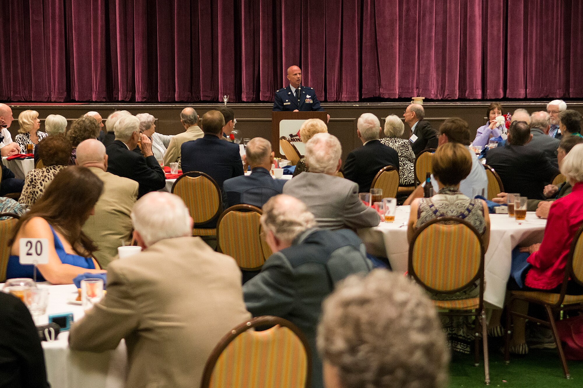 U.S. Air Force Col. Jonathan Ellis, 307th Bomb Wing commander, speaks during the 307th Bomb Wing Combined Bomber/Tanker Reunion dinner, April 26, 2014, Bossier City, La. The 307th Bomb Wing B-47/KC-97 Association chose Bossier City for the site of the reunion because of the reactivation in 2011 of the current 307th Bomb Wing at Barksdale Air Force Base. (U.S. Air Force photo by Master Sgt. Greg Steele/Released)