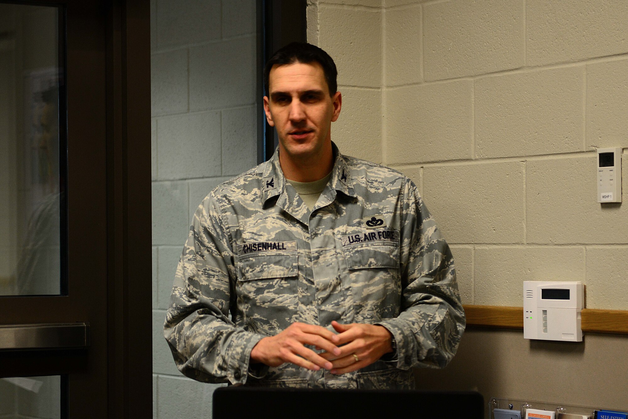 U.S. Air Force Col. David Chisenhall, 633rd Mission Support Group commander, speaks during the ribbon cutting ceremony for the Child Development Center Annex at Langley Air Force Base, Va., April 28, 2014. Chisenhall remarked about the high quality of care provided to the children of Joint Base Langley-Eustis, and the importance of the responsible protection of children and families. (U.S. Air Force photo by Airman 1st Class Kimberly Nagle/Released)