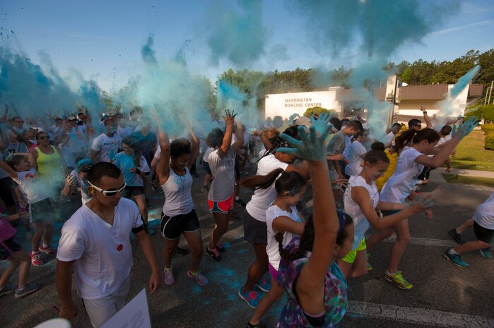 Members of Joint Base Charleston participate in the annual color run 5k fun run on April 26, 2014. The run was held as a Sexual Assualt Awareness event and fundraiser for anyone with base access who wanted to participate and help raise awareness. (U.S. Air Force photo/Staff Sgt. Renae Pittman)