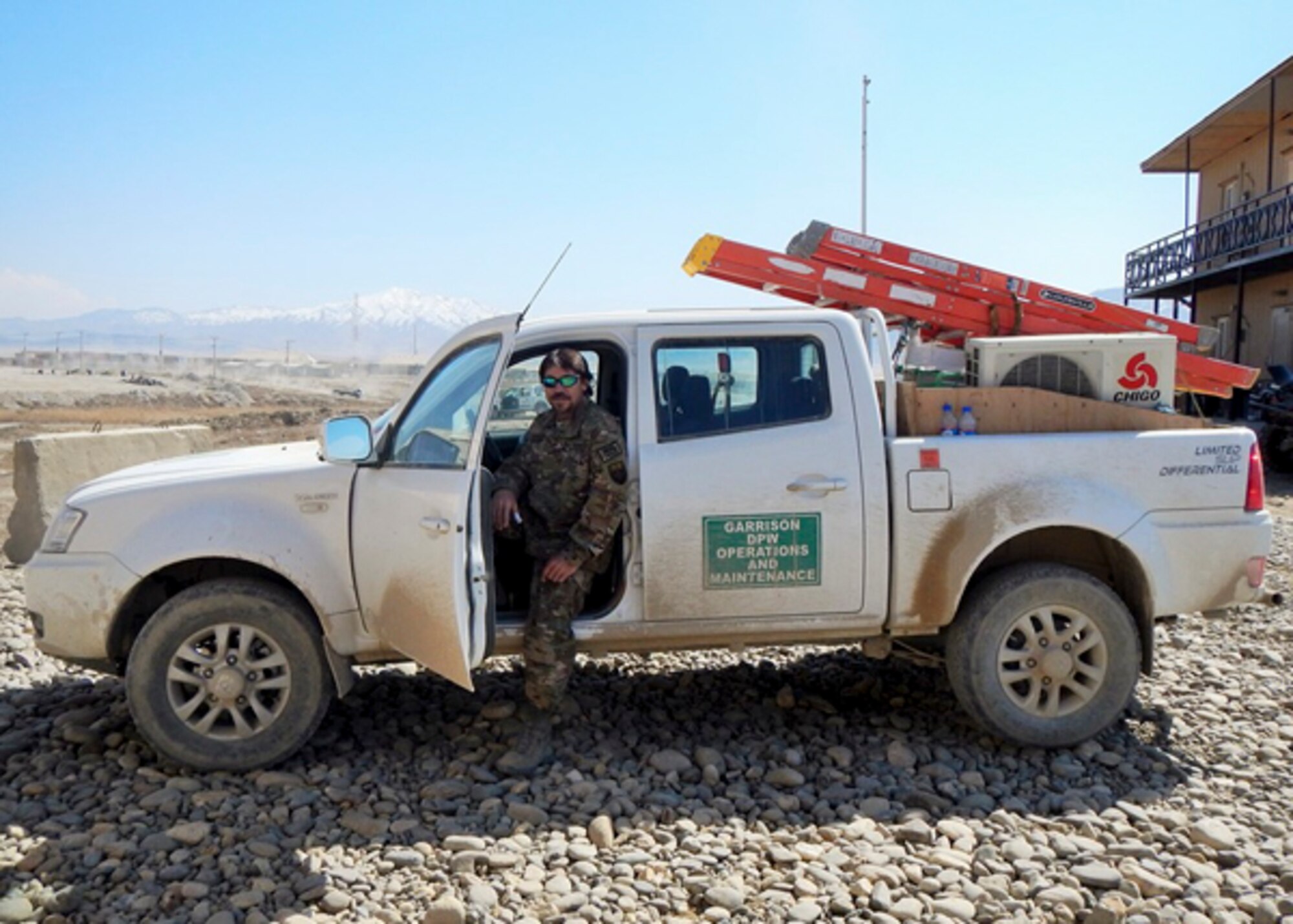 Troy Bagram, Eglin HVAC technician and civilian deployed to Afghanistan responds to a call at the entry control point at Bagram Air Base. (Courtesy photo) 
