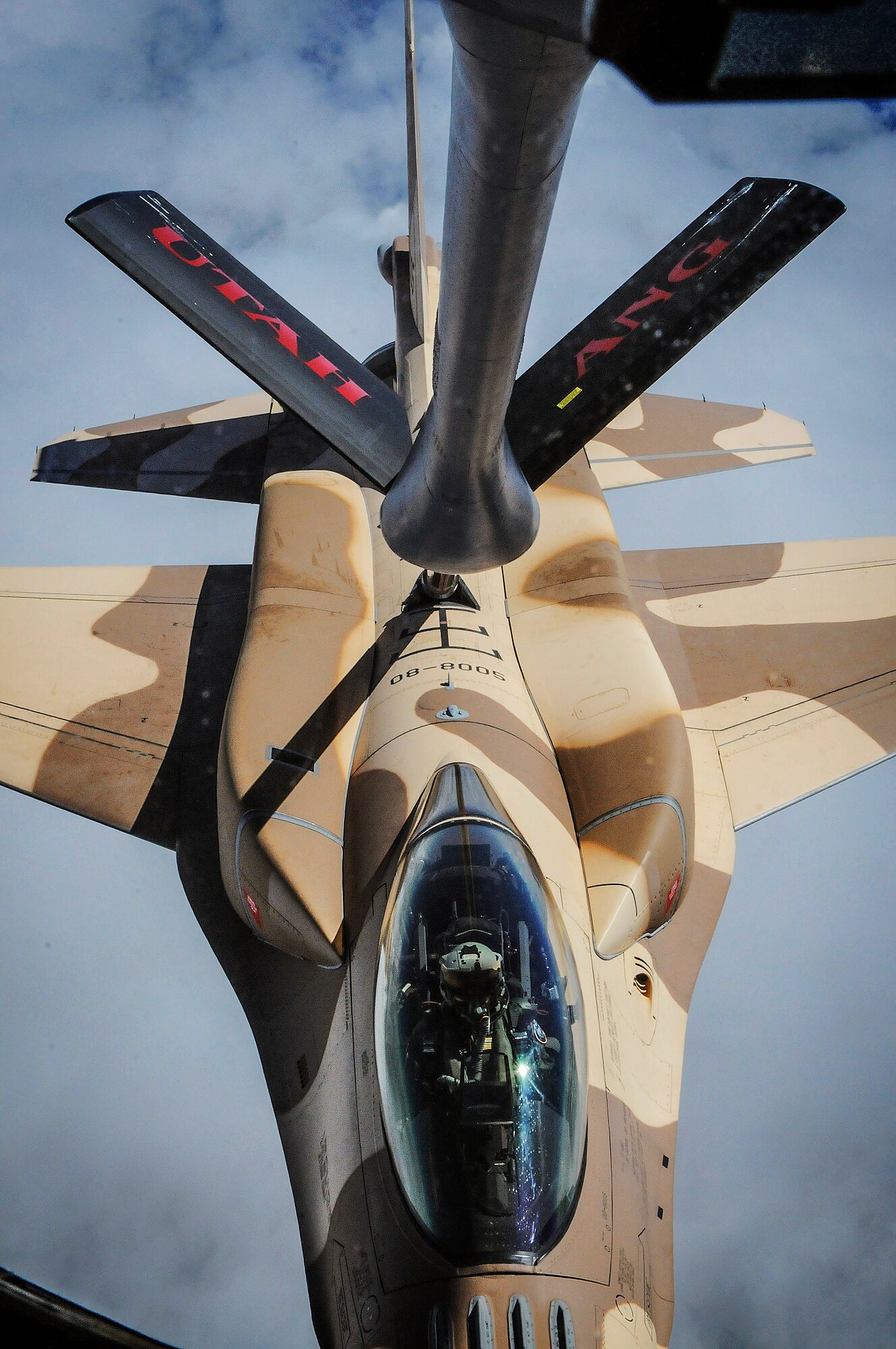 A KC-135 Stratotanker from the 191st Air Refueling Squadron based out of Salt Lake City, Utah refuels an F-16 from the Royal Moroccan air force during the 2014 Aeroexpo Marrakech Trade Show in Morocco April 21. The U.S. Air Force sent a C-130J Super Hercules from the 37th Airlift Squadron based out of Ramstein Air Base, Germany and a KC-135 Stratotanker to showcase air assets that are critical to the success of current and future multinational military operations in Africa. (U.S. Army photo/ Sgt. Nicolas A. Cloward)