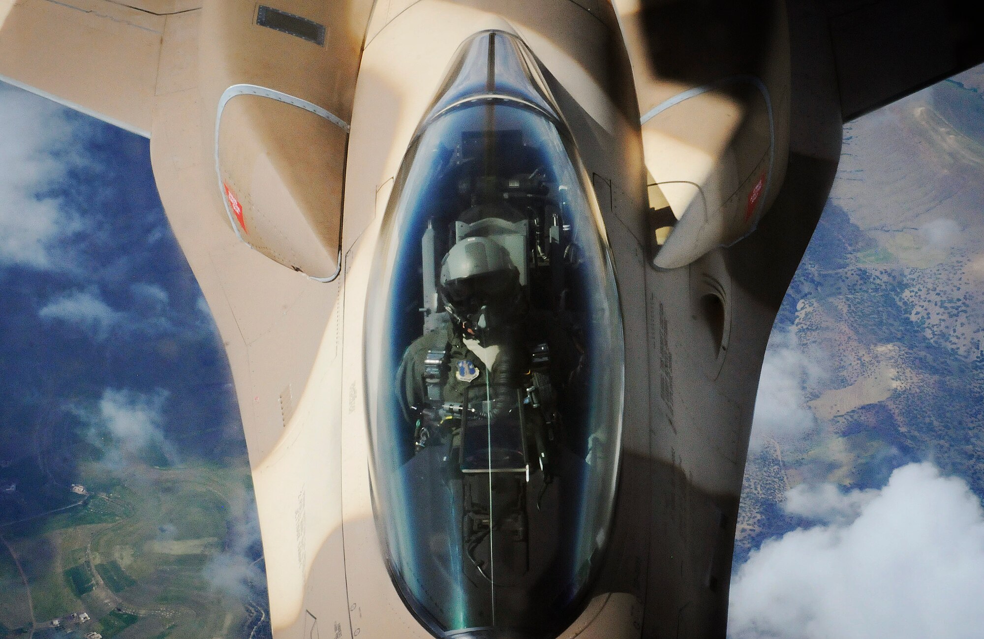 An F-16 from the Royal Moroccan air force links up with a KC-135 Stratotanker from the 191st Air Refueling Squadron based out of Salt Lake City, Utah to refuel during the 2014 Aeroexpo Marrakech Trade Show in Morocco April 21. The U.S. Air Force sent a C-130J Super Hercules from the 37th Airlift Squadron based out of Ramstein Air Base, Germany and a KC-135 Stratotanker to showcase air assets that are critical to the success of current and future multinational military operations in Africa. (U.S. Army photo/ Sgt. Nicolas A. Cloward)