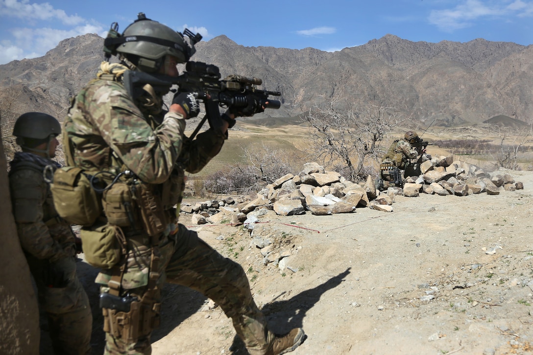 A U.S. Army Special Forces soldier provides security during a clearing operation in Denasaro Kelay village in the Mizan district of Zabul province, Afghanistan, March 8, 2014. The soldiers, assigned to Combined Joint Special Operations Task Force Afghanistan, assisted Afghan commandos with efforts to disrupt insurgent movement in the area. 