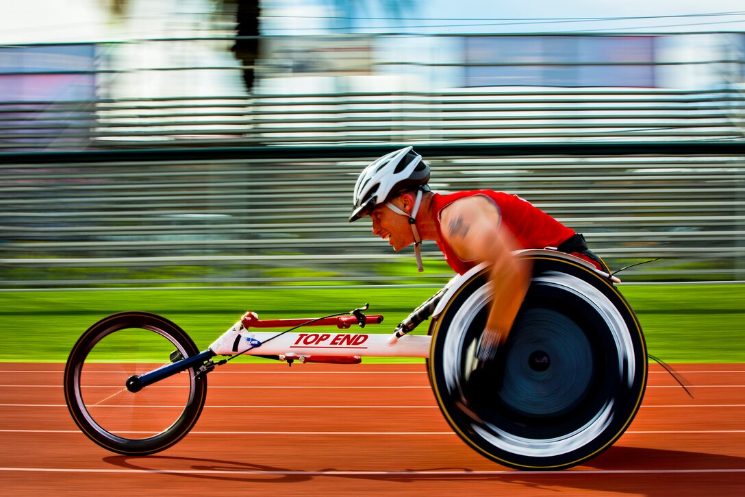 Marine Corps Sgt. David Tupper races around the track during practice at the 2014 Marine Corps Trials on Camp Pendleton, Calif., March 7, 2014. Athletes compete in archery, cycling, shooting, swimming, track, field, sitting volleyball and wheelchair basketball during the event, which runs through March 12.The Marine Corps Wounded Warrior Regiment enables wounded, ill, or injured Marines to focus on their abilities and find new avenues to thrive. 