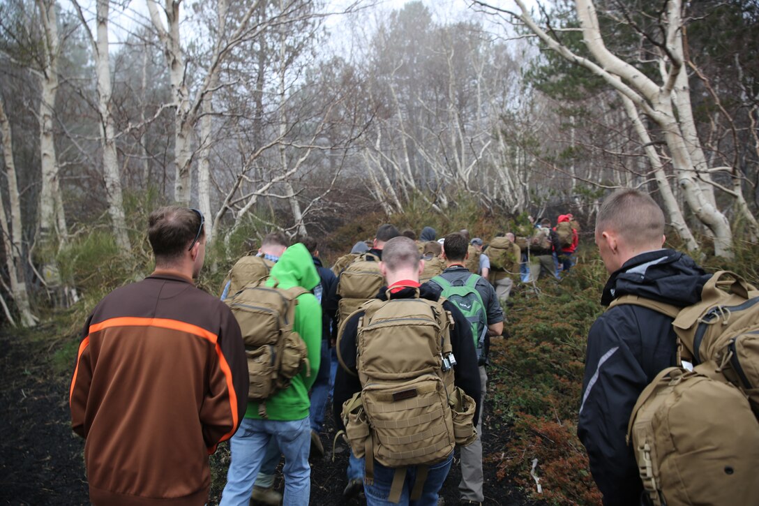 Marines and sailors with Special-Purpose Marine Air-Ground Task Force Africa 14 prepare to hike up a trail on Mt. Etna, Italy, April 26, 2014. The service members hiked up the volcano in observance of Earth Day.