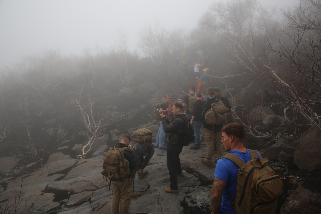 Marines and sailors with Special-Purpose Marine Air-Ground Task Force Africa 14 hike up a trail on Mt. Etna, Italy, April 26, 2014. The service members hiked up the volcano in observance of Earth Day.