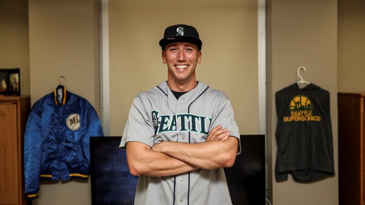 Sergeant Kristopher Golden, radio chief, 15th Marine Expeditionary Unit, is one of the Seattle Mariners biggest fans. Golden, 27, is from Lacey, Wash.