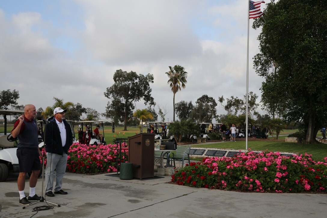 Maj. Gen. Steven Busby, commanding general of 3rd Marine Aircraft Wing, announces the beginning of a golf tournament aboard Marine Corps Air Station Miramar, Calif., April 25. Busby also explained the importance of fundraising for scholarship for military children and thanked the volunteers for putting the event together.