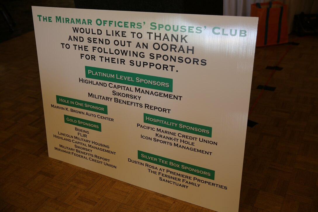 A sign displays sponsors who donated to a golf tournament fundraiser aboard Marine Corps Air Station Miramar, Calif., April 25. The MCAS Miramar Officers’ Spouses’ Club held the tournament and luncheon to raise money for scholarships for military children.