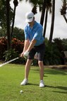 Cpl. Joseph A. Pervis, native of Atlanta, Ga., and training noncommissioned officer with 2nd Assault Amphibian Battalion, 2nd Marine Division, Marine Corps Base Camp Lejeune, N.C., tees off while playing in a golf scramble at the Fort Lauderdale Country Club in Plantation, Fla., April 29. Marines and Sailors from the USS New York (LPD 21) participated in the golf scramble as part of a military appreciation event during Fleet Week Port Everglades 2014. Approximately 120 Marines from 2nd  AAV Bn., 2nd Battalion, 6th Marine Regiment, 2nd Marine Division, Marine Corps Base Camp Lejeune, N.C., and Marine Light Attack Helicopter Squadron (HMLA) 269, Marine Corps Air Station New River, N.C., are participating in the 24th Annual Fleet Week in Port Everglades; South Florida’s annual celebration of maritime forces. (U.S. Marine Corps photo by Sgt. Alicia R. Leaders/Released)