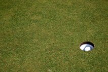 Cpl. Grant A. Warren, native of Columbus, Ohio, and amphibious assault vehicle crewman with 2nd Assault Amphibian Battalion, 2nd Marine Division, Marine Corps Base Camp Lejeune, N.C., sinks a putt while playing in a golf scramble at the Fort Lauderdale Country Club in Plantation, Fla., April 29. Marines and Sailors from the USS New York (LPD 21) participated in the golf scramble as part of a military appreciation event during Fleet Week Port Everglades 2014. Approximately 120 Marines from 2nd  AAV Bn., 2nd Battalion, 6th Marine Regiment, 2nd Marine Division, Marine Corps Base Camp Lejeune, N.C., and Marine Light Attack Helicopter Squadron (HMLA) 269, Marine Corps Air Station New River, N.C., are participating in the 24th Annual Fleet Week in Port Everglades; South Florida’s annual celebration of maritime forces. (U.S. Marine Corps photo by Sgt. Alicia R. Leaders/Released)