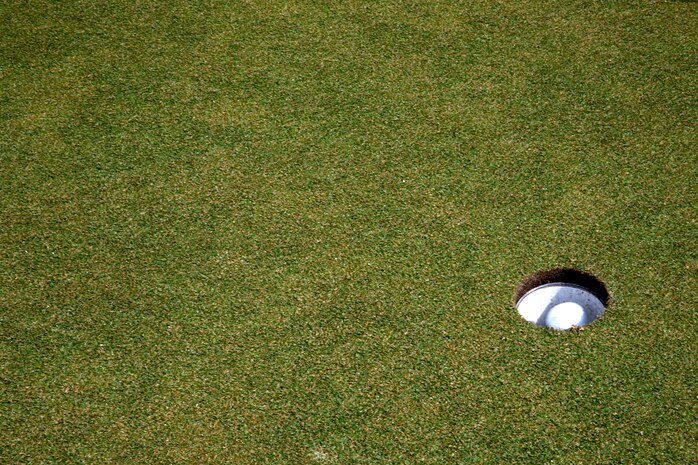Cpl. Grant A. Warren, native of Columbus, Ohio, and amphibious assault vehicle crewman with 2nd Assault Amphibian Battalion, 2nd Marine Division, Marine Corps Base Camp Lejeune, N.C., sinks a putt while playing in a golf scramble at the Fort Lauderdale Country Club in Plantation, Fla., April 29. Marines and Sailors from the USS New York (LPD 21) participated in the golf scramble as part of a military appreciation event during Fleet Week Port Everglades 2014. Approximately 120 Marines from 2nd  AAV Bn., 2nd Battalion, 6th Marine Regiment, 2nd Marine Division, Marine Corps Base Camp Lejeune, N.C., and Marine Light Attack Helicopter Squadron (HMLA) 269, Marine Corps Air Station New River, N.C., are participating in the 24th Annual Fleet Week in Port Everglades; South Florida’s annual celebration of maritime forces. (U.S. Marine Corps photo by Sgt. Alicia R. Leaders/Released)