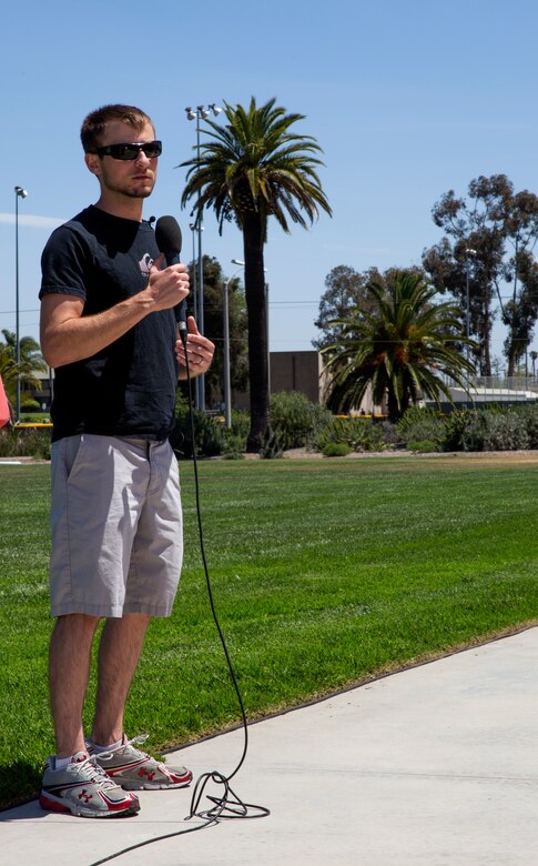 Greg Nelson, a veteran Marine and guest speaker for the fifth annual Sexual Assault Awareness Month Walk and a sexual assault survivor, speaks to participants after the walk aboard Marine Corps Air Station Miramar, Calif., April 29. Nelson shared what he went through as a survivor to show that sexual assault can happen to anyone regardless of gender, military service or the color of someone’s skin.
