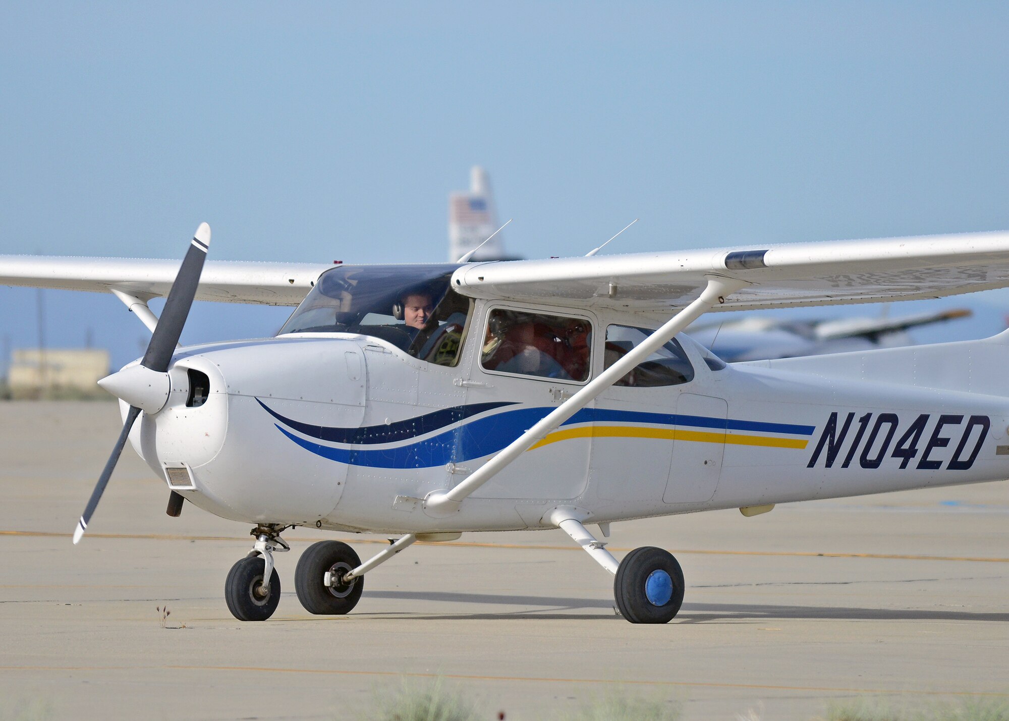 Jacob Nelson (far left), Aero Club certified flight instructor, prepares to taxi out with Aero Camp students April 23, before their flight to Tehachapi, Calif. This year's second annual Aero Camp was held April 21 to 25, and is intended to train students, ages 14 to 19, with the help of certified flight instructors in the areas of flight and ground school training. The second camp is scheduled for late July.(U.S. Air Force photo by Jet Fabara)