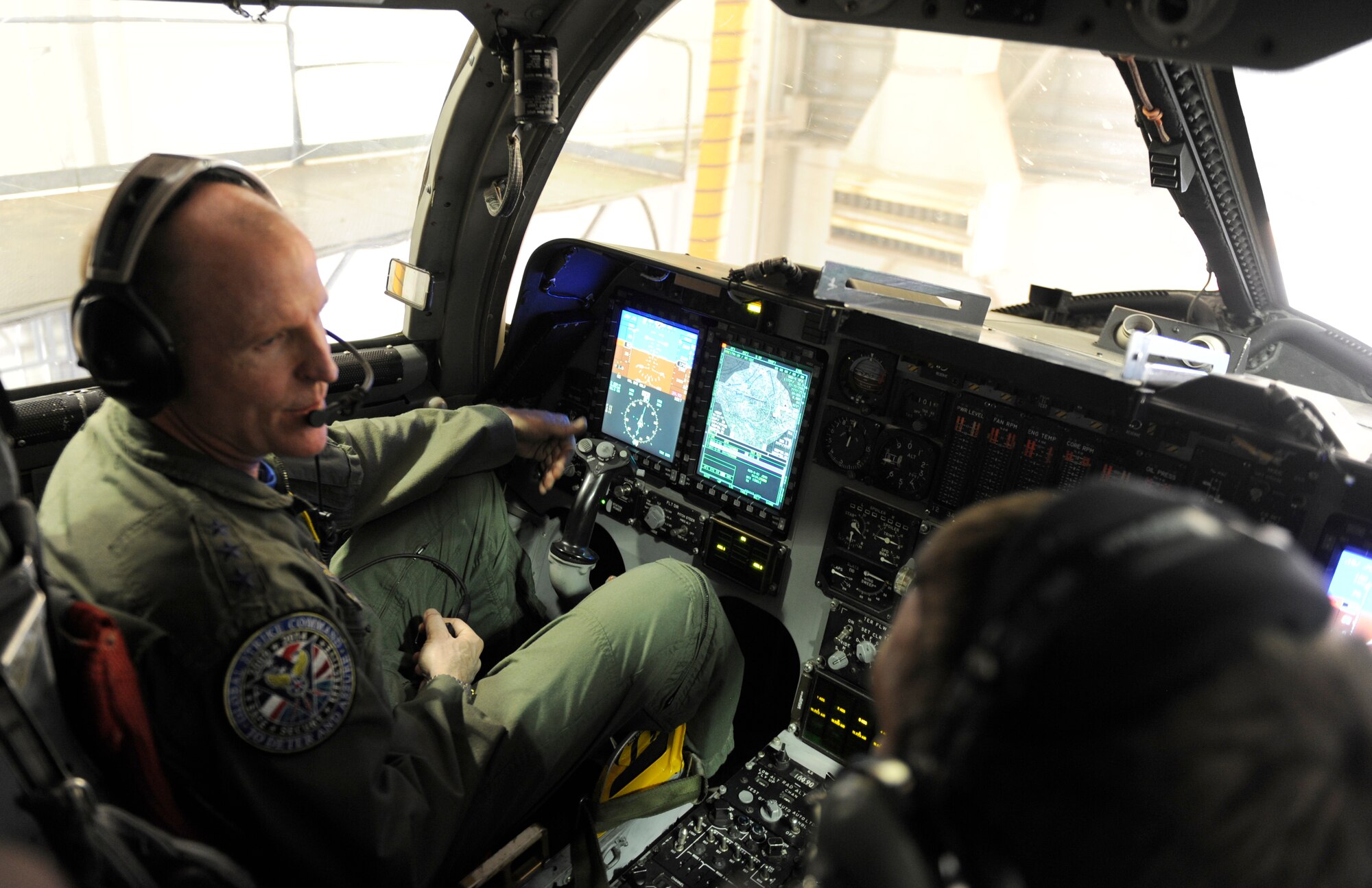 U.S. Air Force Lt. Gen. Stephen Wilson, Air Force Global Strike Command commander, is shown the new displays of an upgraded B-1B Lancer April 25, 2014, at Dyess Air Force Base, Texas. The B-1 was recently updated with an Integrated Battle Station. IBS is a combination of three different upgrades, which include a Fully Integrated Data Link, a Vertical Situation Display upgrade and a Central Integrated System upgrade. (U.S. Air Force photo by Airman 1st Class Alexander Guerrero/Released)